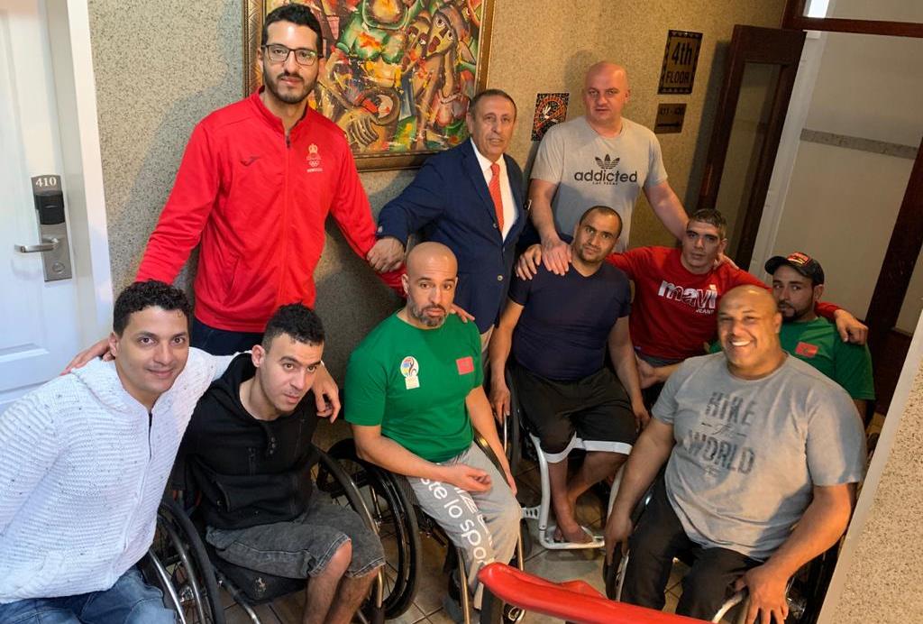 Mr Youssef Amrani and members of the Moroccan Paralympics wheelchair basketball